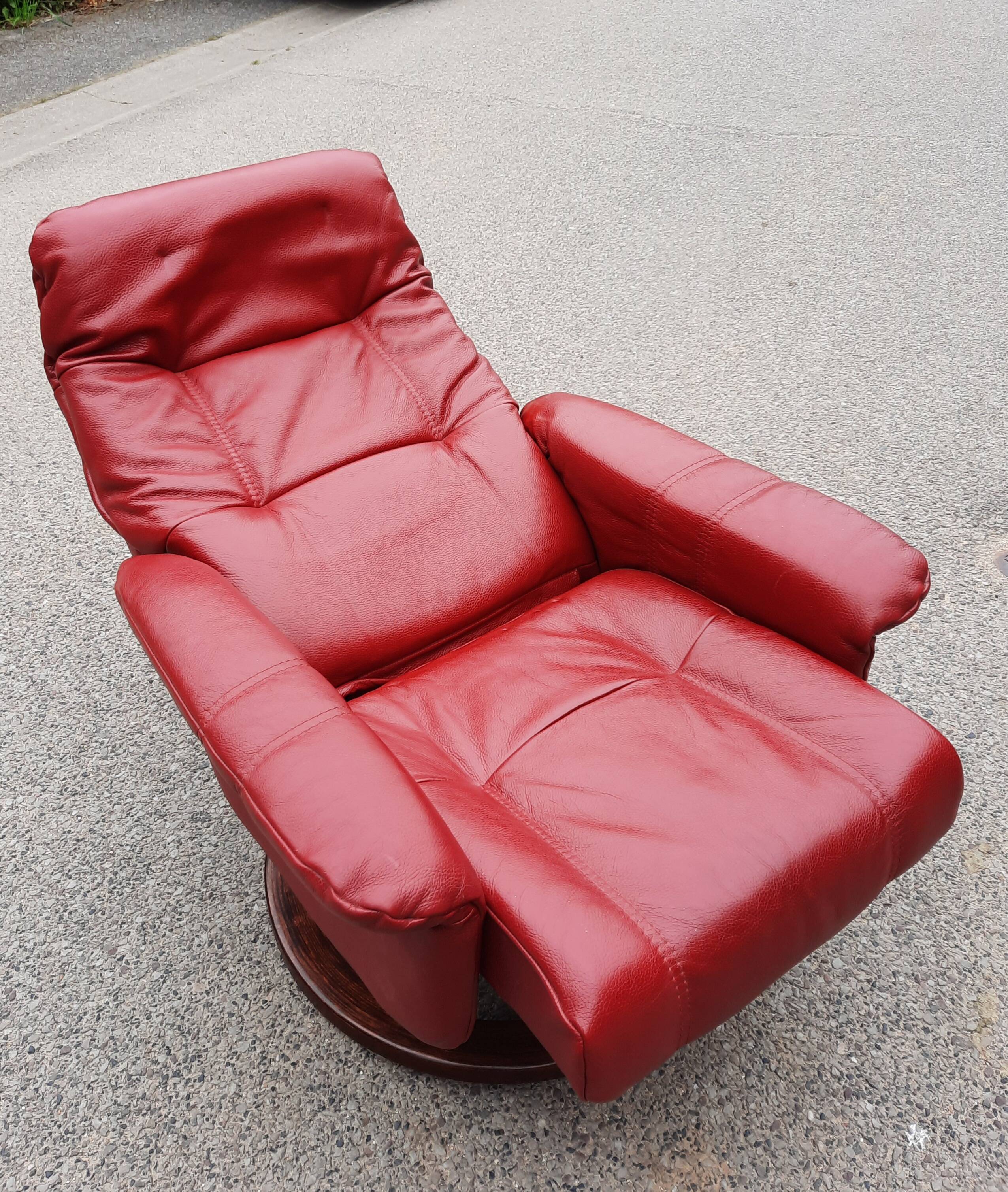 Red leather relax armchair and pouf