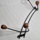 Vintage wood and wrought iron wall rack from the 1950s