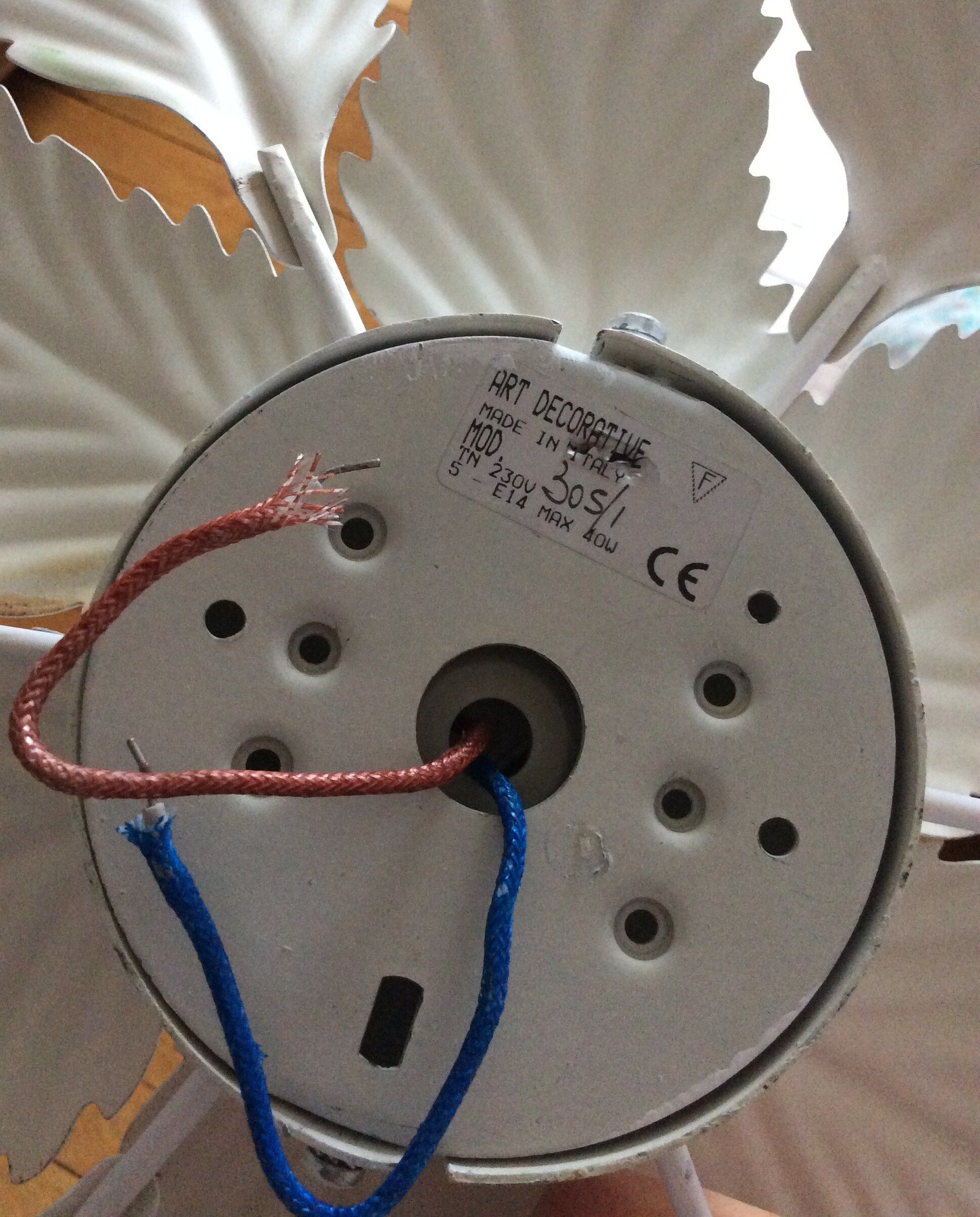 white lacquered metal flower applique