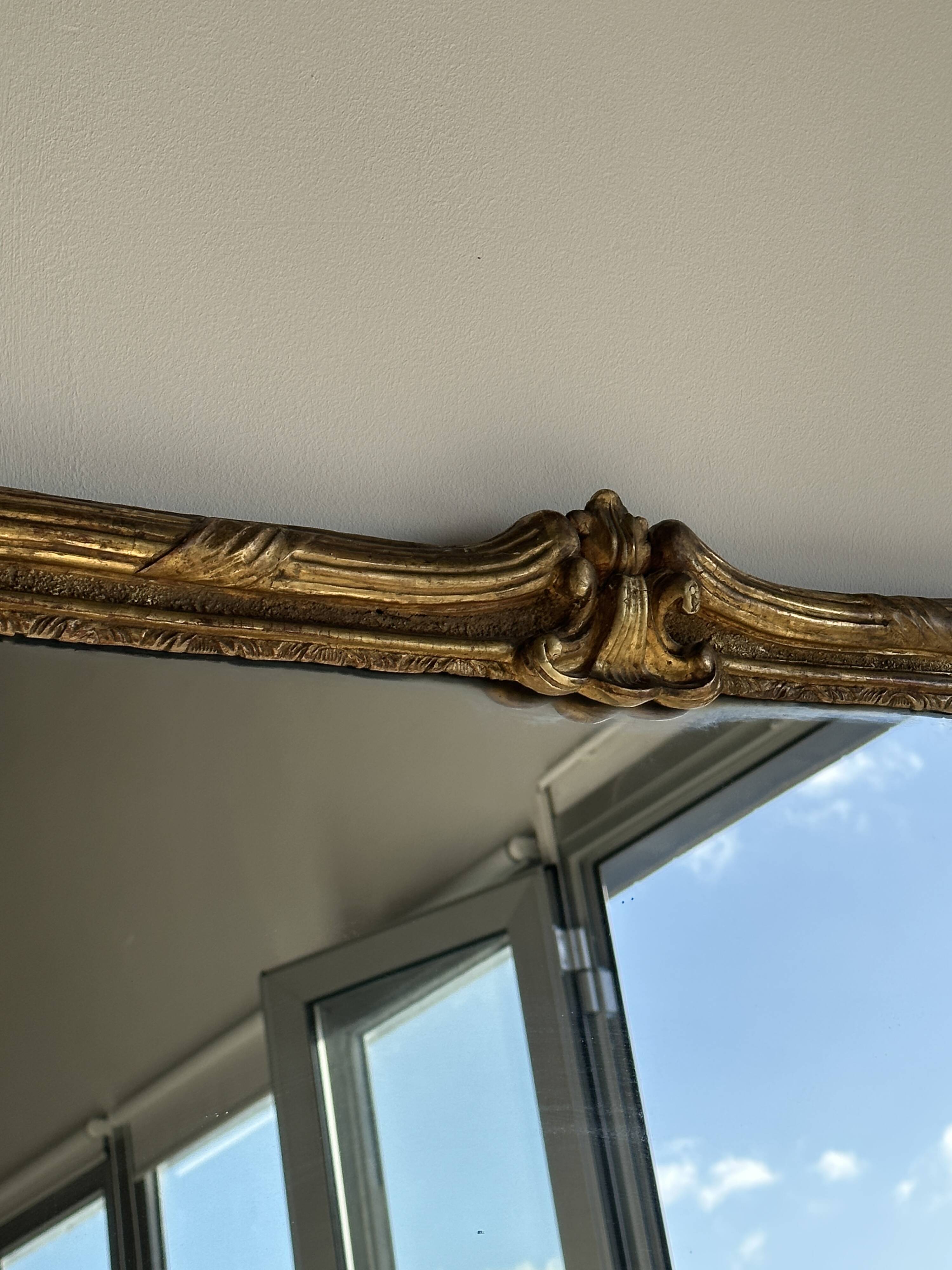 Large gilded mirror 19th century rounded corners mercury glass Louis XVI style