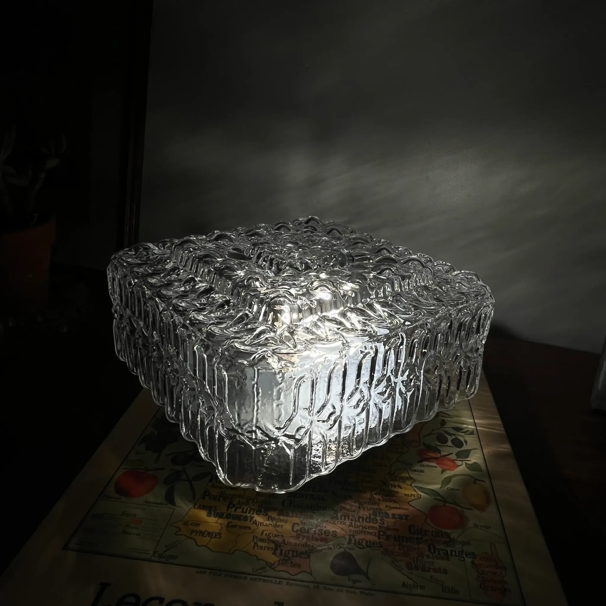 Old small square wall light ceiling fixture with transparent vintage glass.
