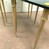 Pull out tables in brass and black glass XX century