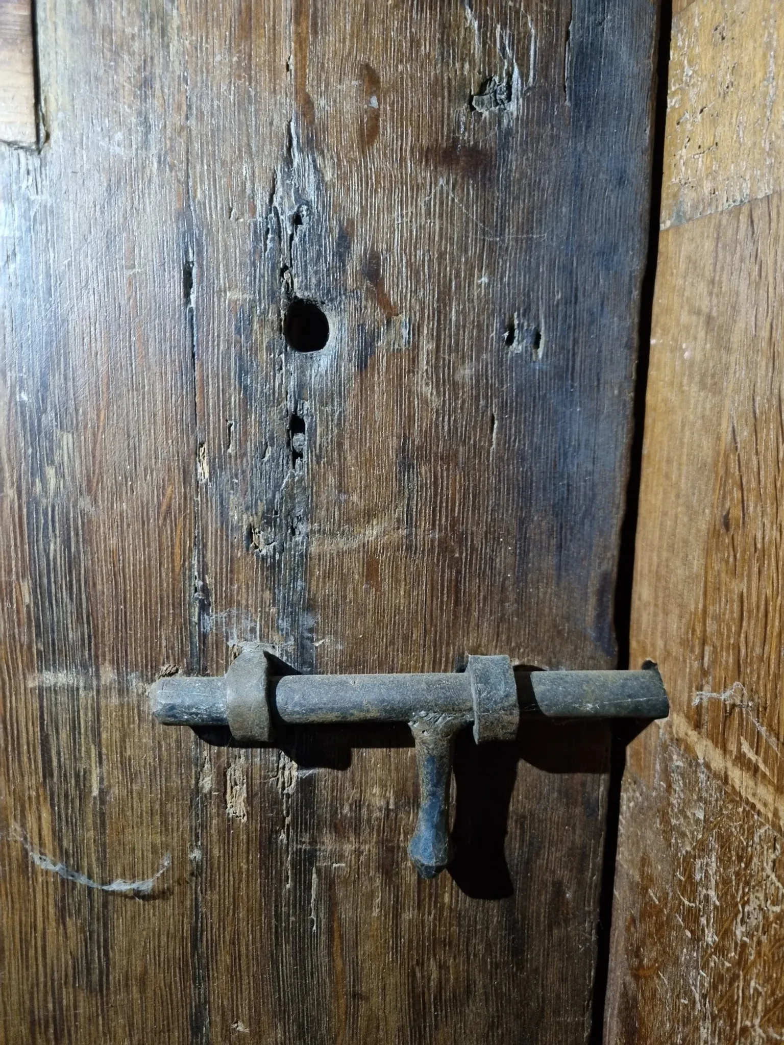Antique oak door with frame and pierced wrought-iron lock – 16th–17th c.