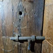 Antique oak door with frame and pierced wrought-iron lock – 16th–17th c.