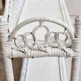 White woven wicker shelf