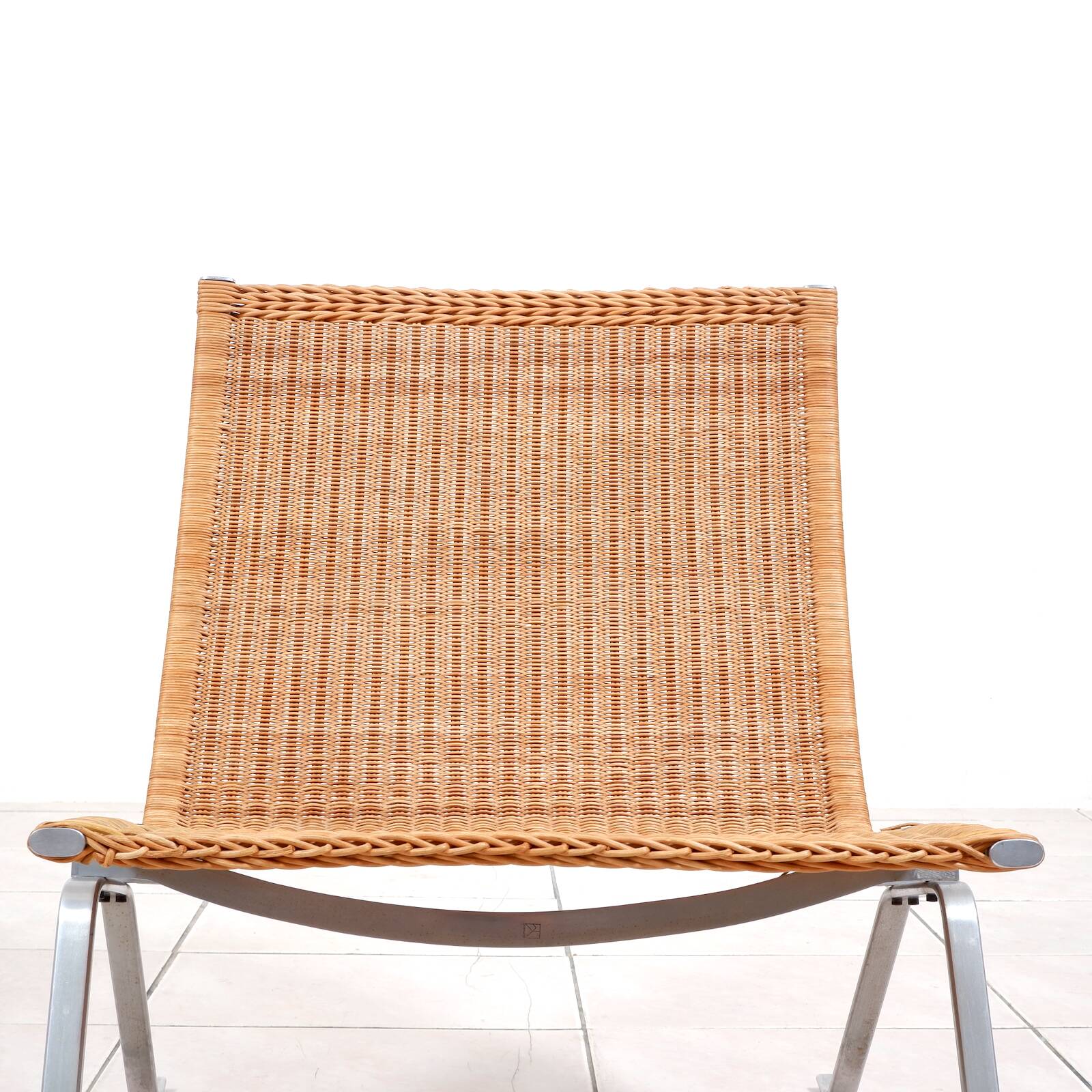 PK 22“ lounge chair in rattan by Poul Kjaerholm for E. Kold Christensen