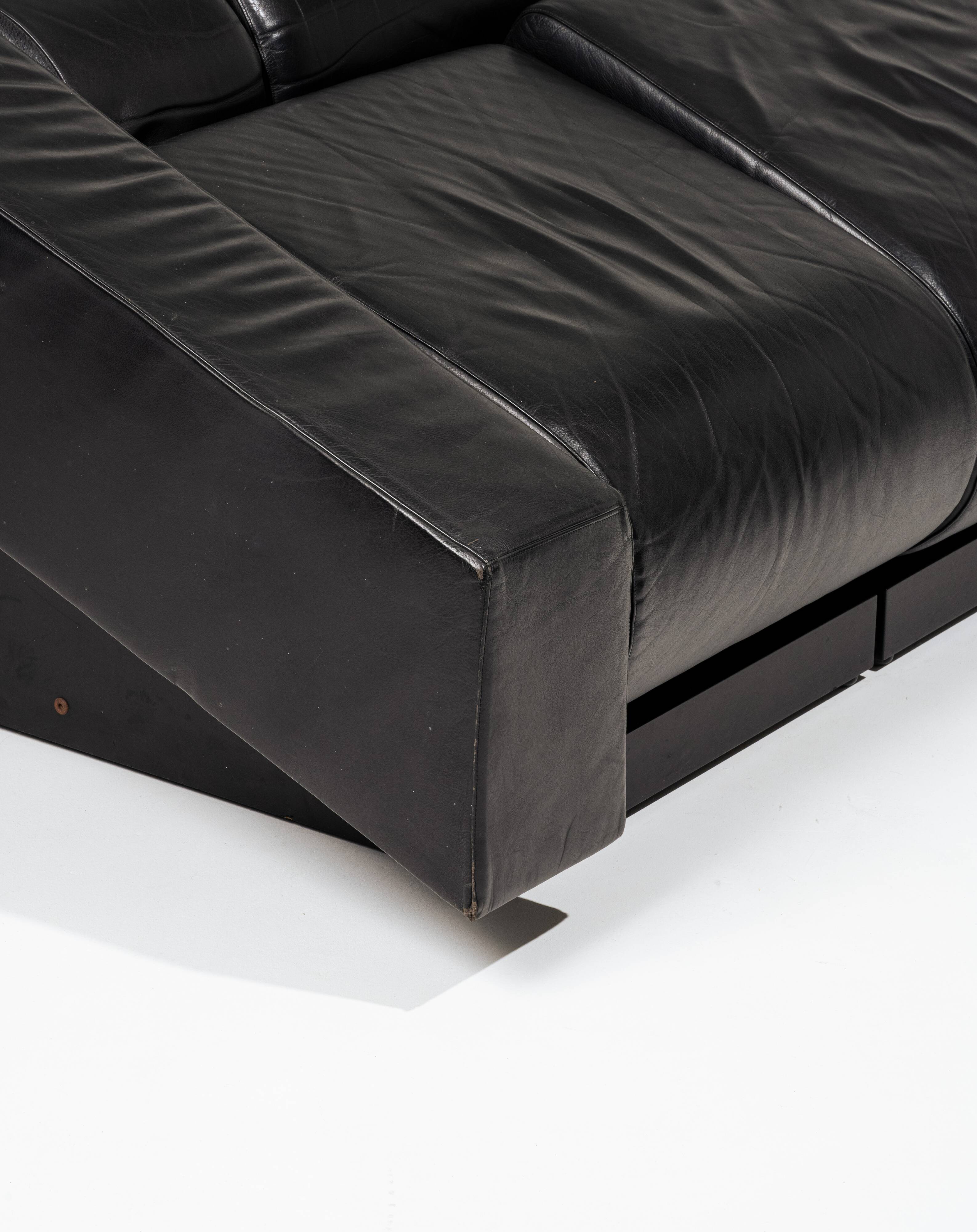 Obliqua two-seater leather sofa, Mario Botta, 1980s