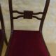 2 stylish solid wood chairs with red velvet fabric seats
