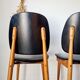 Paire de chaises vintage 1960 – Pieds compas & Simili-cuir noir