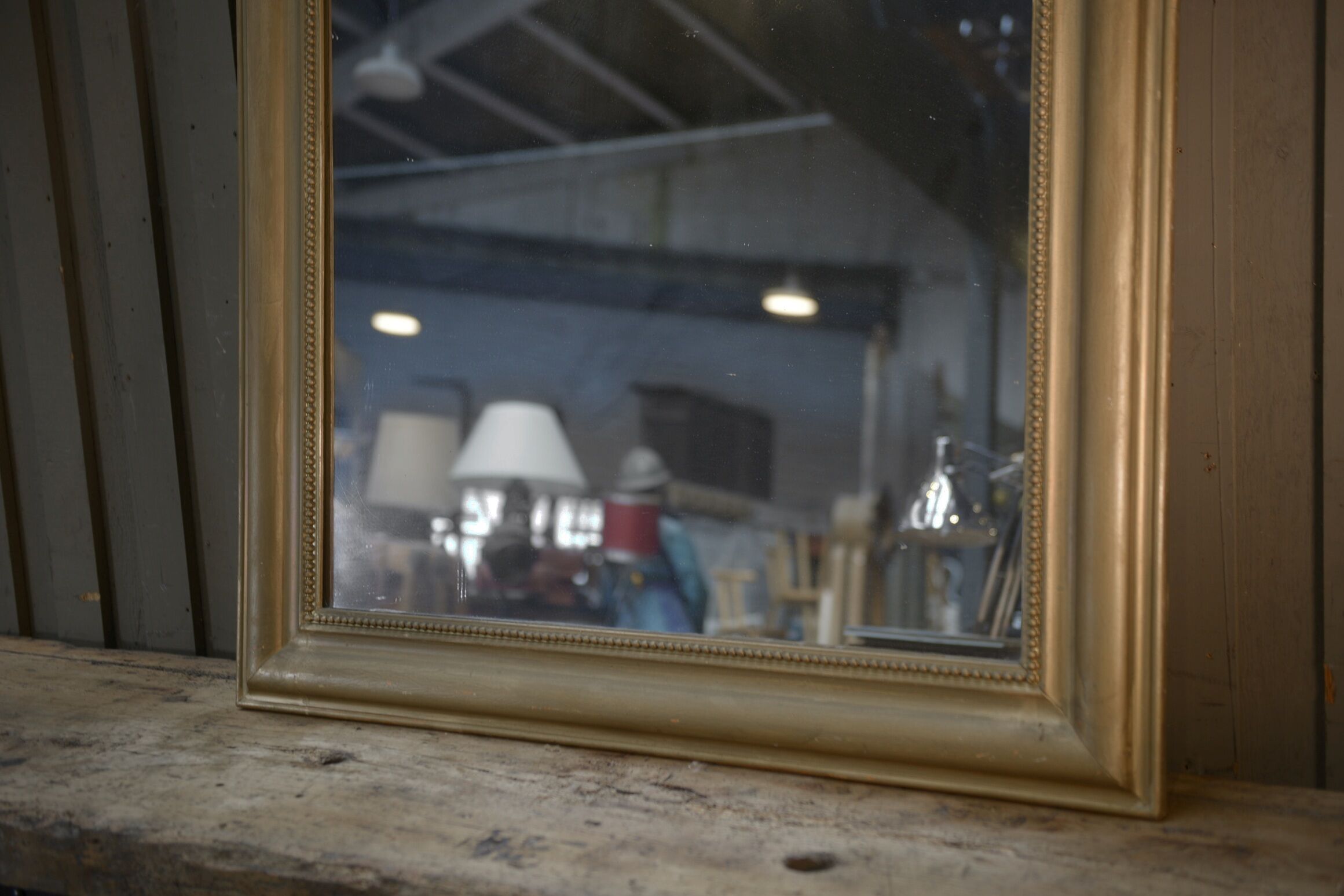 Old mirror in gilded wood 19th