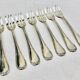 7 Christofle silver-plated oyster forks with Louis crossed ribbons
