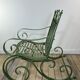 Rocking-chair en fer forgé vert patiné