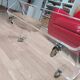 Design coffee table from Habitat in transparent plexiglass, mounted on wheels.