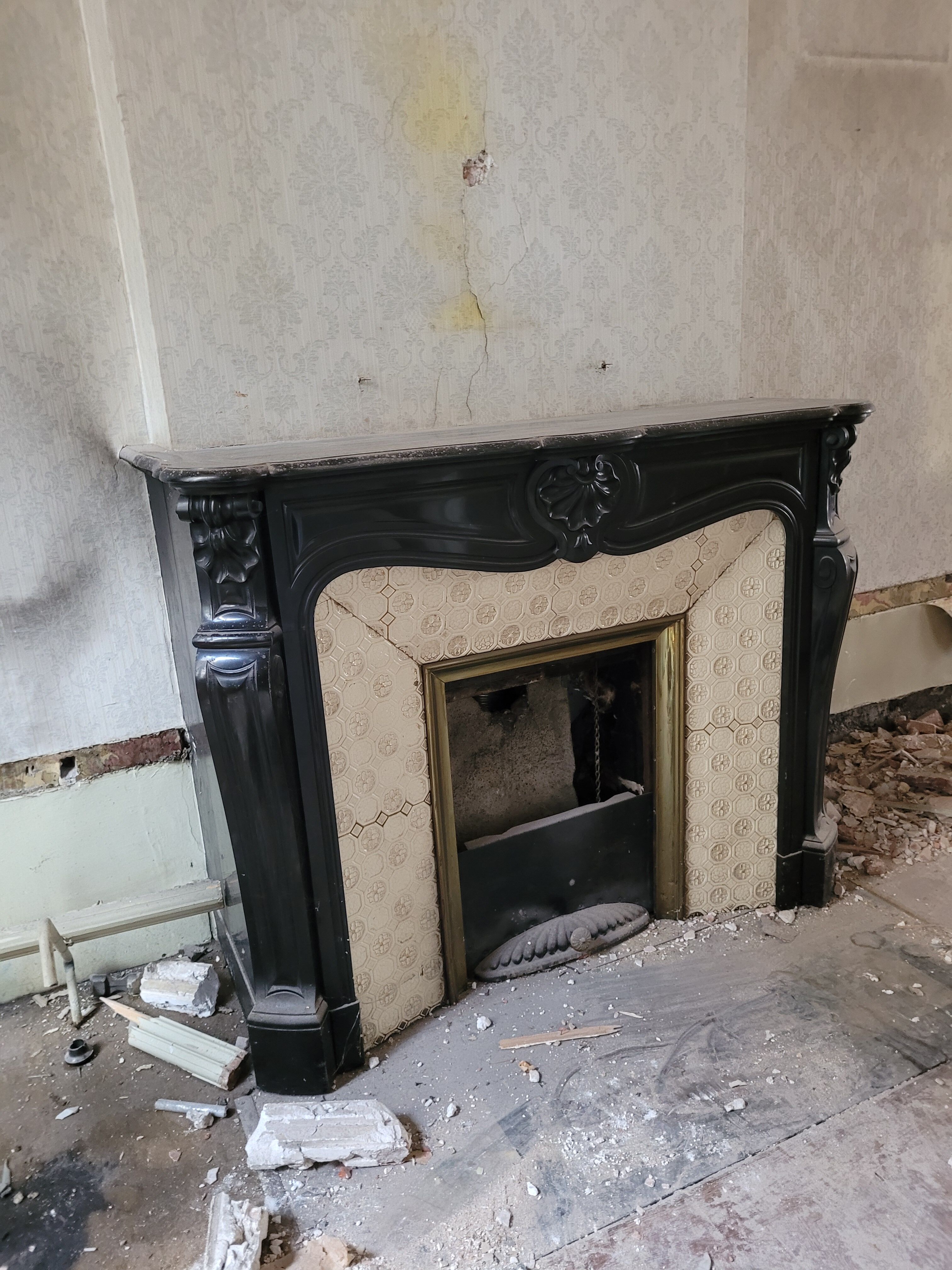 Louis XV style fireplace in black marble