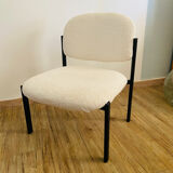 White and metal loop design armchair