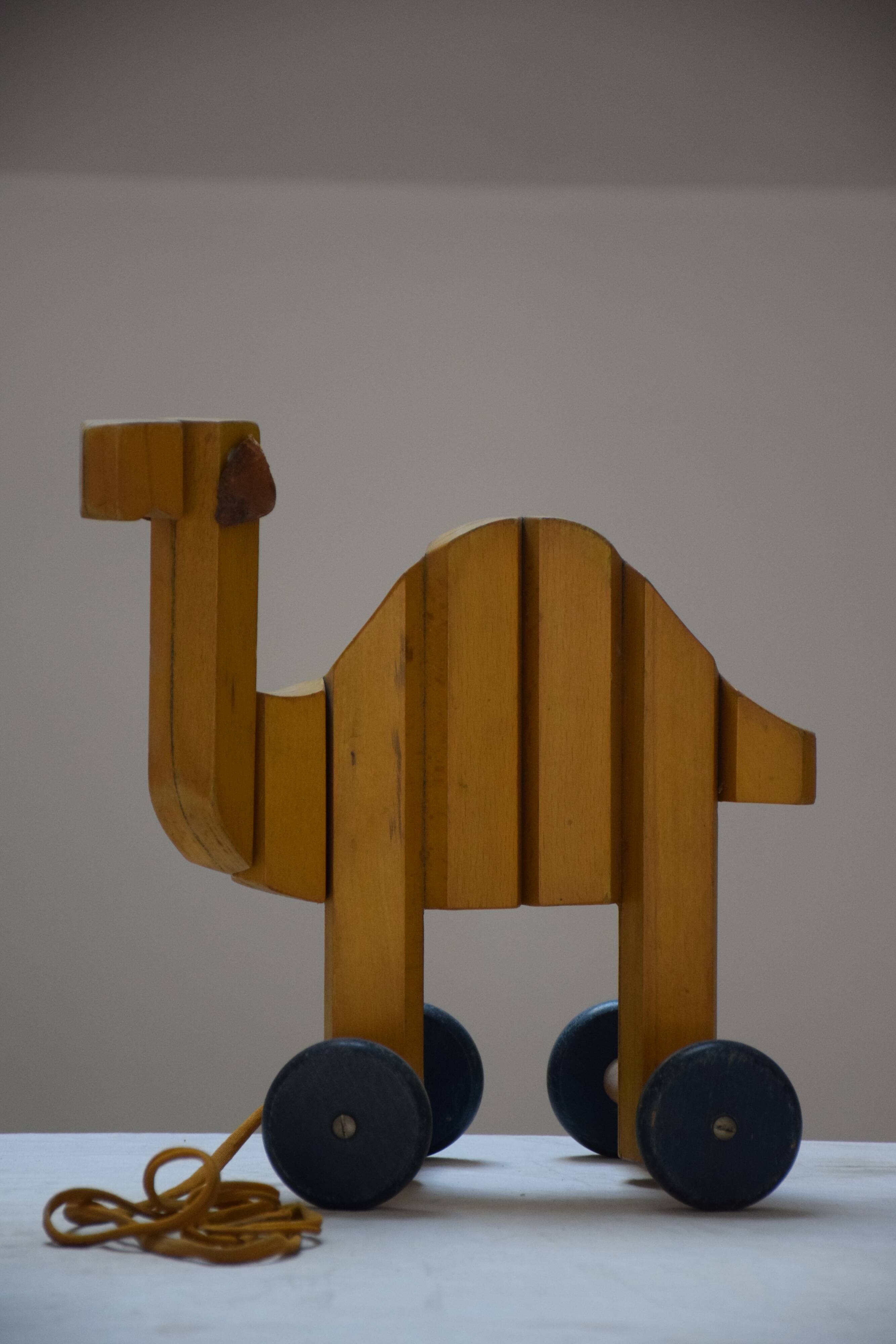 Children's wooden dog and camel