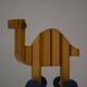 Children's wooden dog and camel