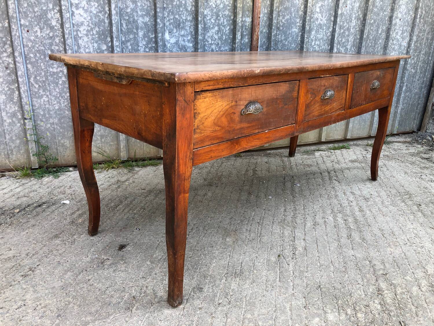Antique solid cherry farmhouse table with 3 drawers and 2 pulls