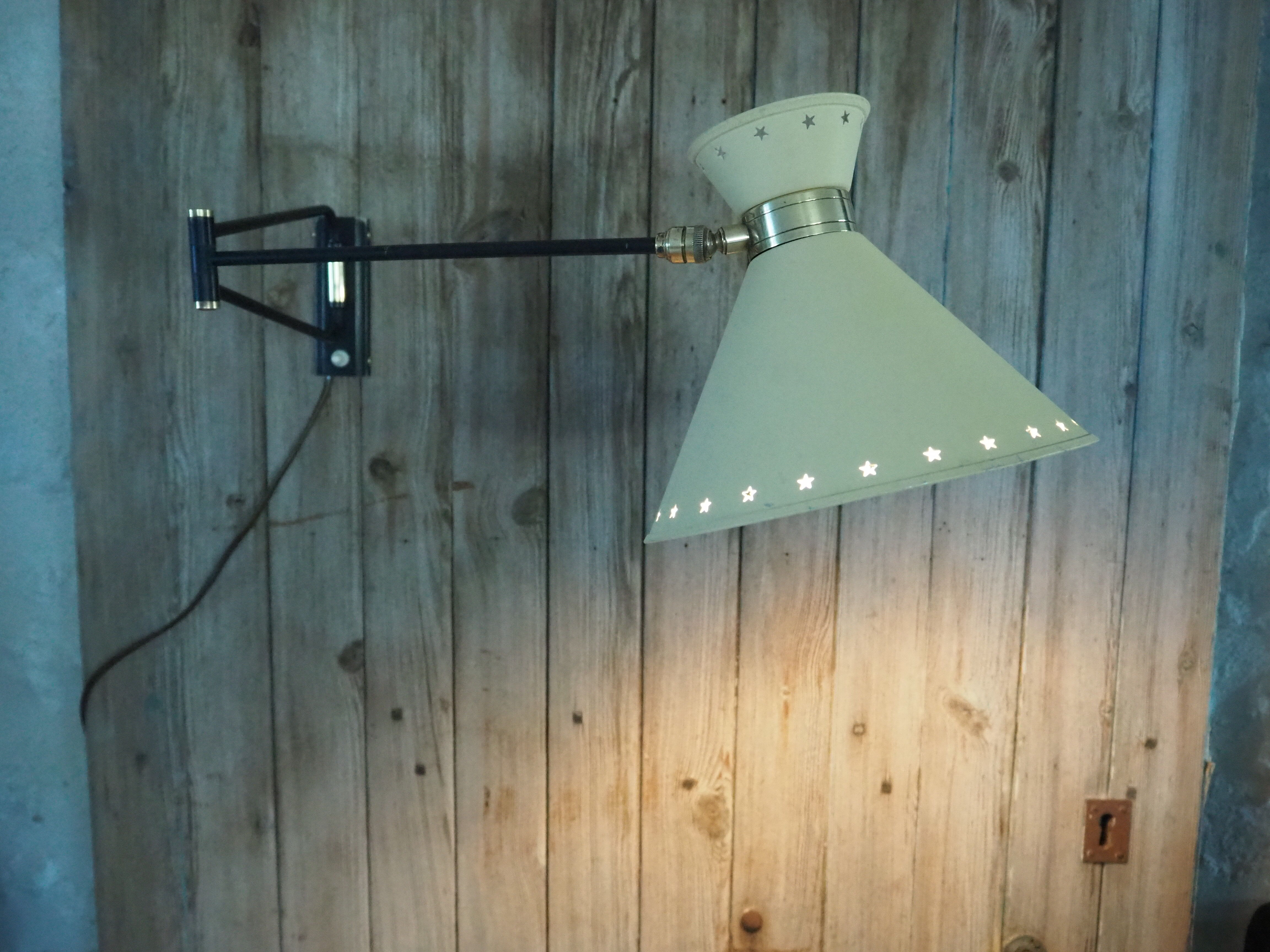 Diabolo articulated wall lamp by designer René Mathieu