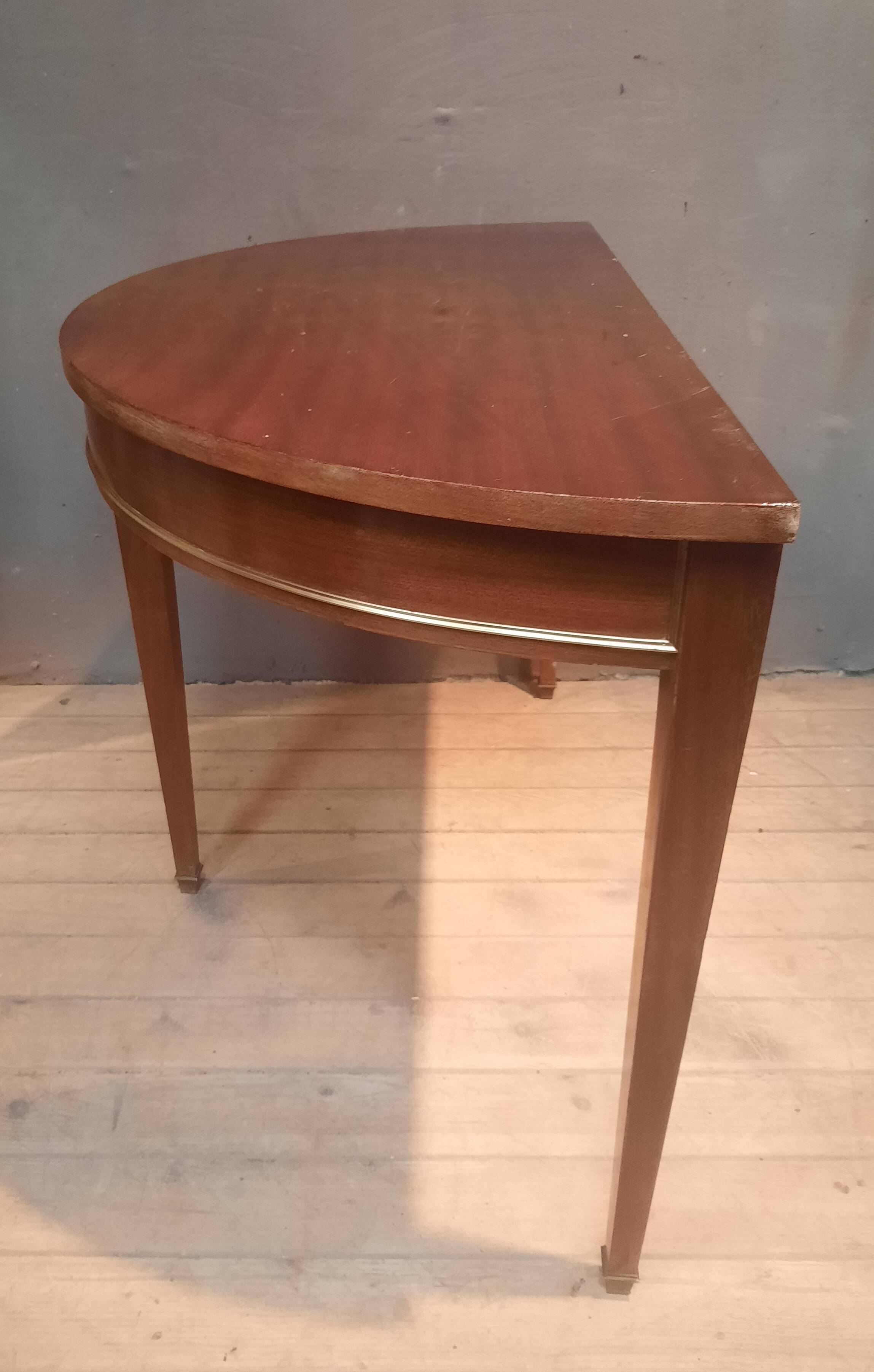 Louis XVI style console in mahogany.