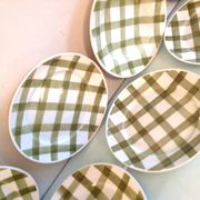 Set of six flat plates and one Moulin des Loups bowl, green tablecloth model/1950s-1960s