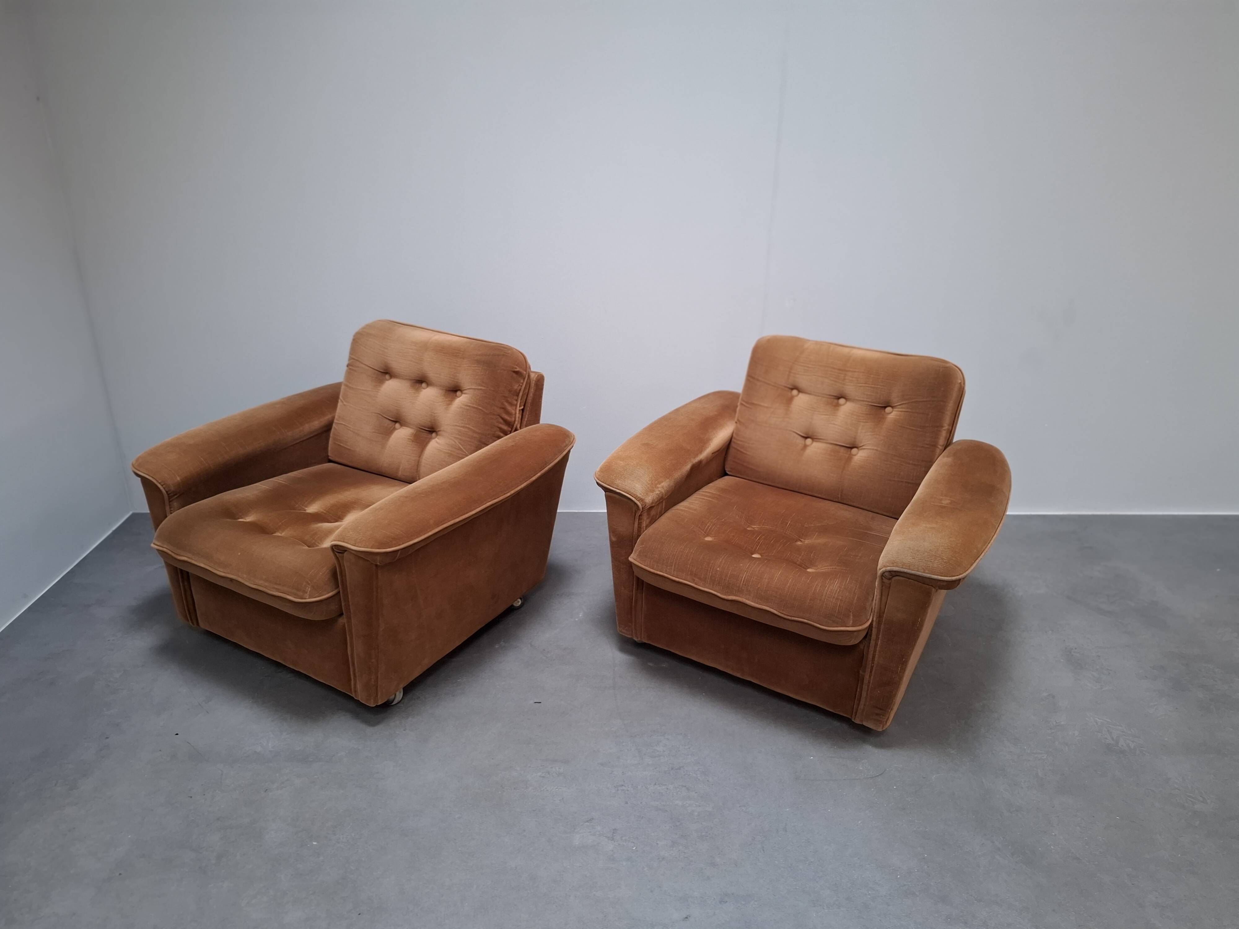 Pair of Mid-Century Modern Czech Lounge Armchairs with Rolling Casters