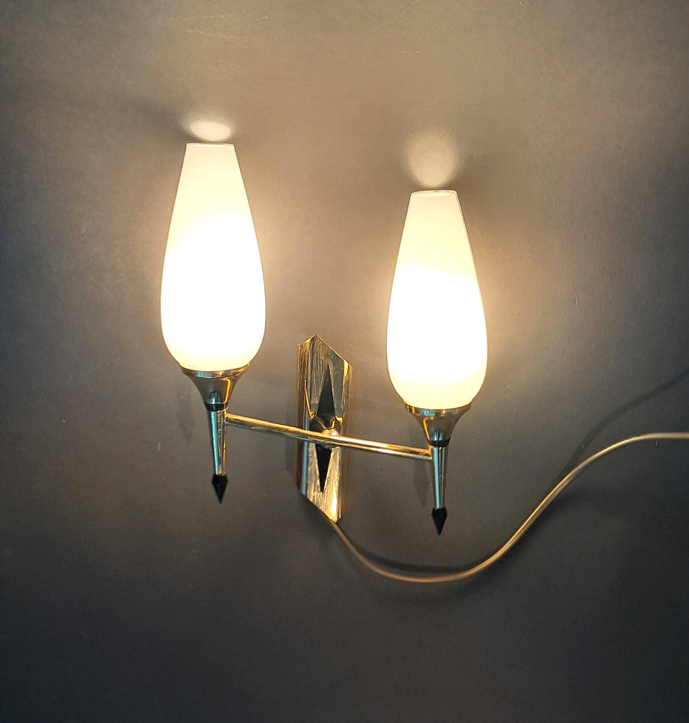 Small two-light wall lamp, white opaline and gilded brass, Circa 1960.