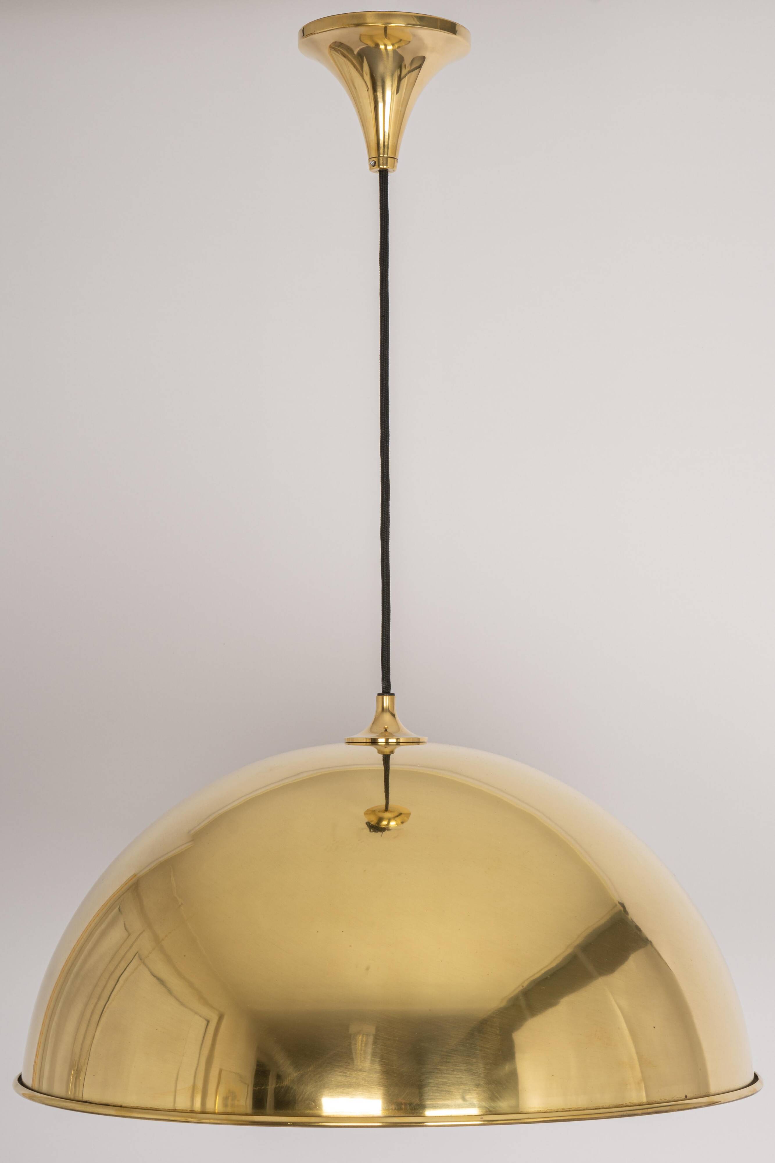Large suspended brass chandelier by Florian Schulz, Germany.