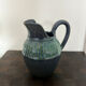 Stoneware jug with glaze