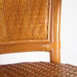 Paire de fauteuils en rotin et cuir tressé