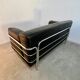 Old vintage leather and tubular metal sofa, design 70s