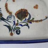 Sandstone cake dish with a fish decoration