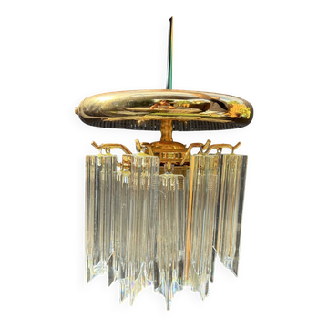 Brass ceiling light with cut glass in a triedri style.