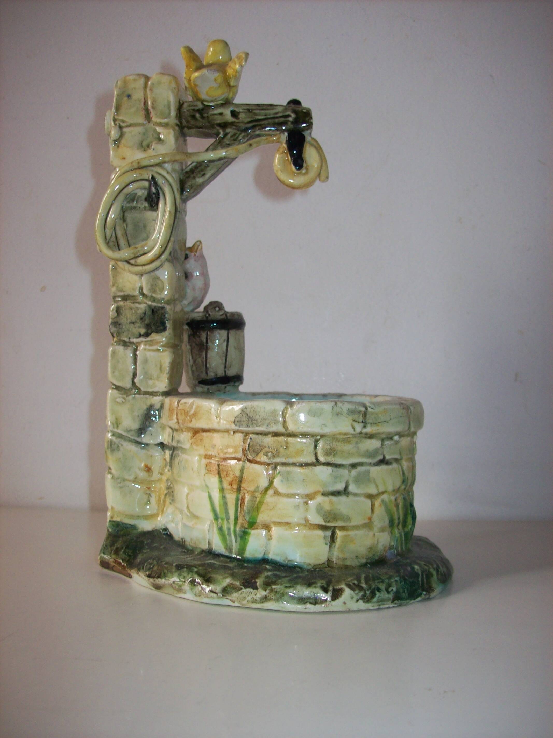 Planter in the style of Jérôme Massier bird well