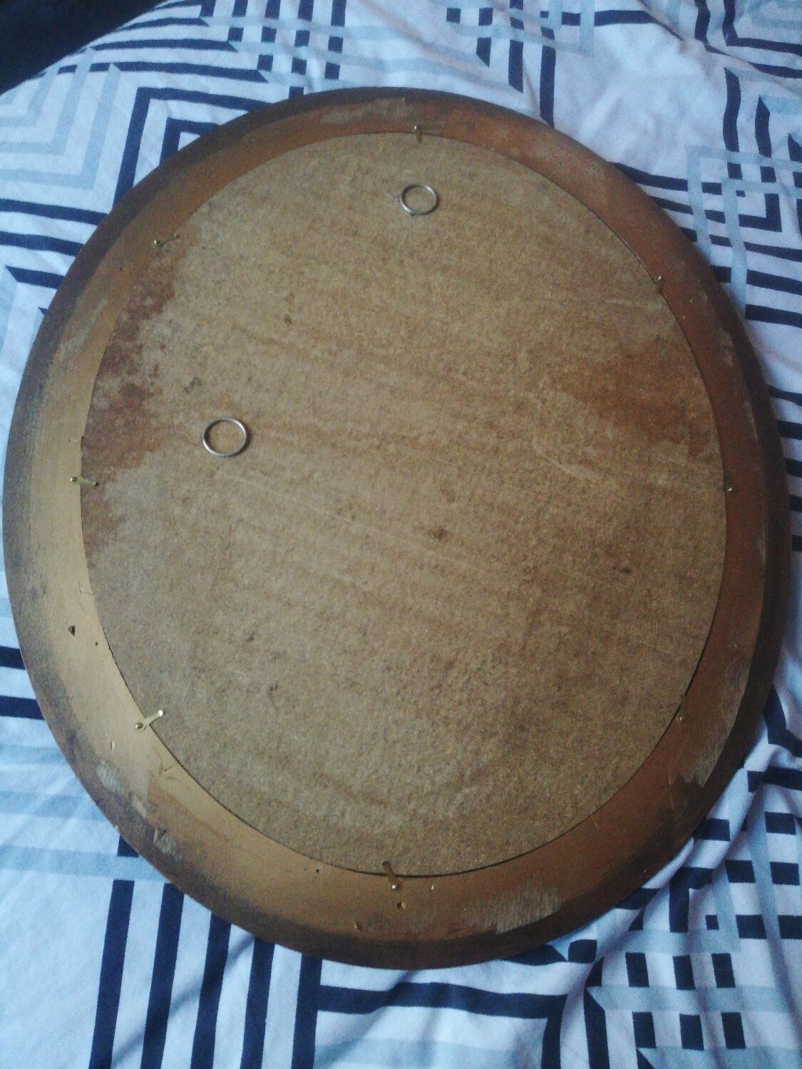 Oval mirror in wood and gold
