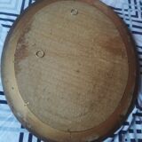 Oval mirror in wood and gold