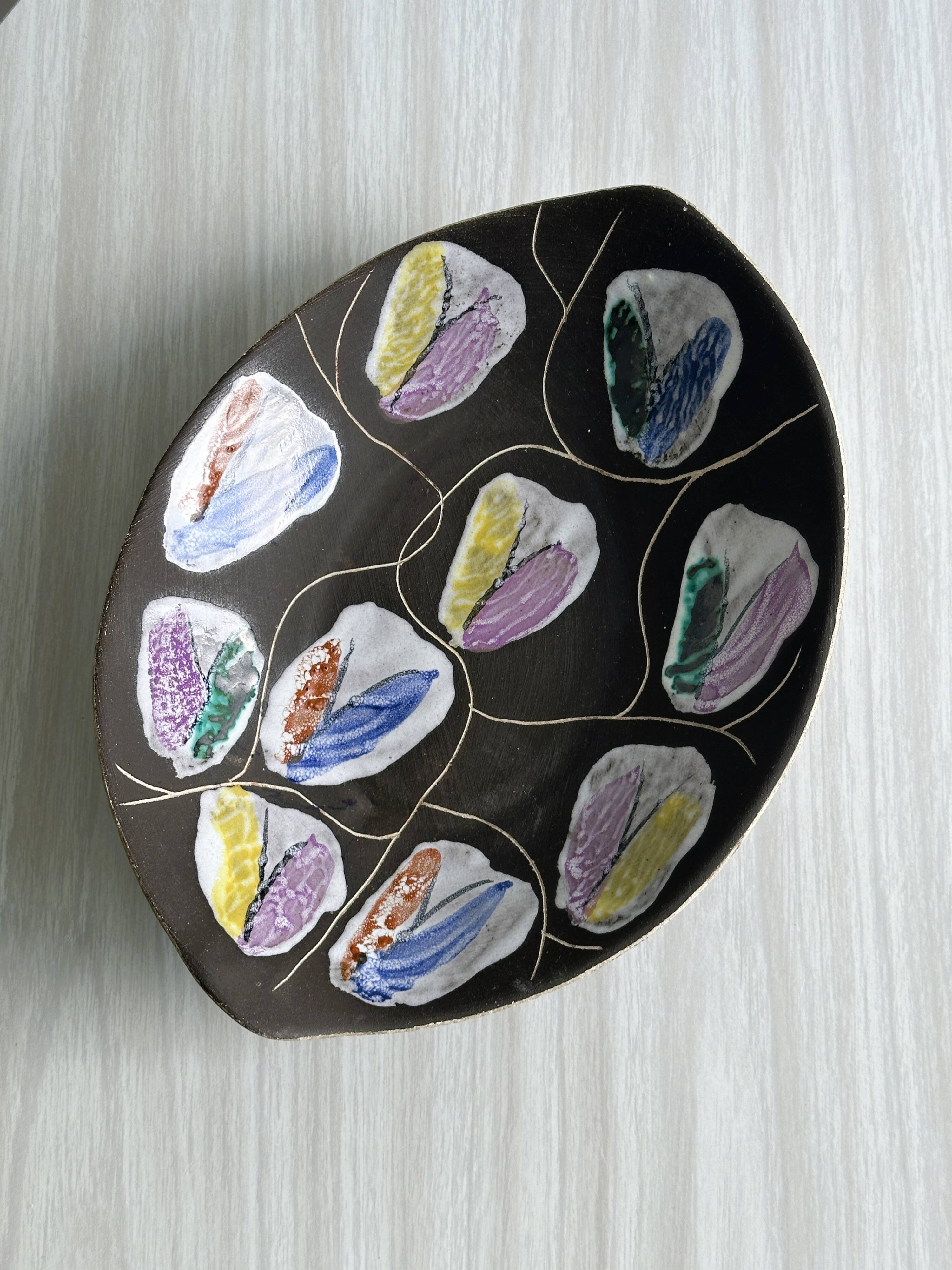 Dish, hand-painted ceramic basket, artistic design.