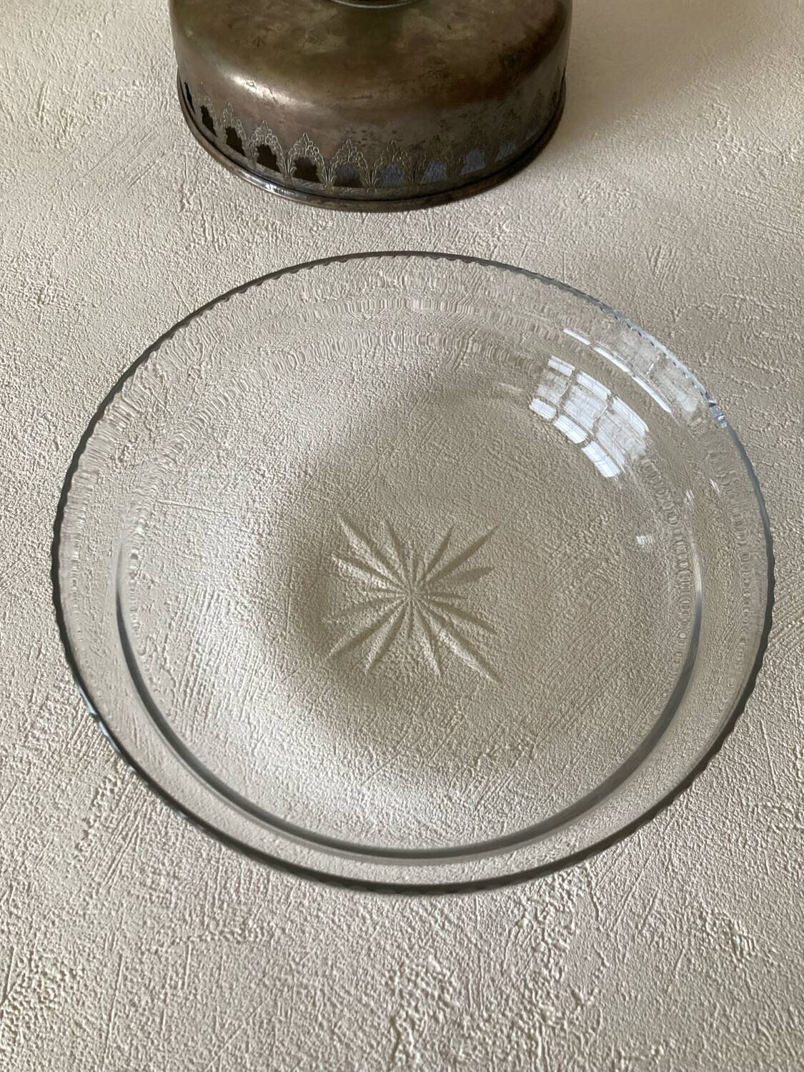 Antique crystal fruit bowl on a brass pedestal