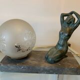 Art Deco lamp with woman and opaline globe on marble