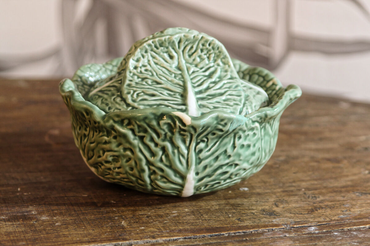 Covered pot in slip, collard greens