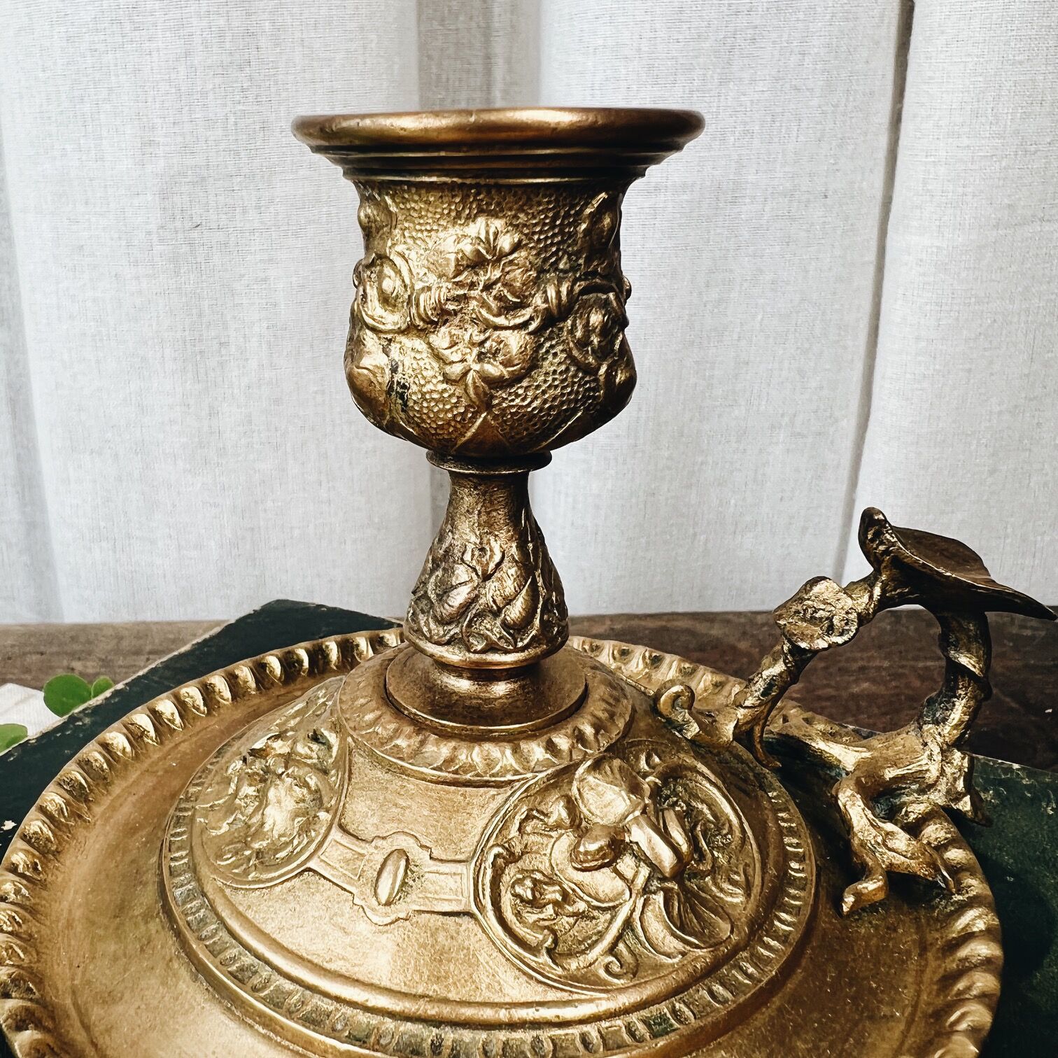 Bronze cellar rat candle holder
