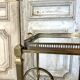 Rolling bar cart in brass and bronze circa 1960