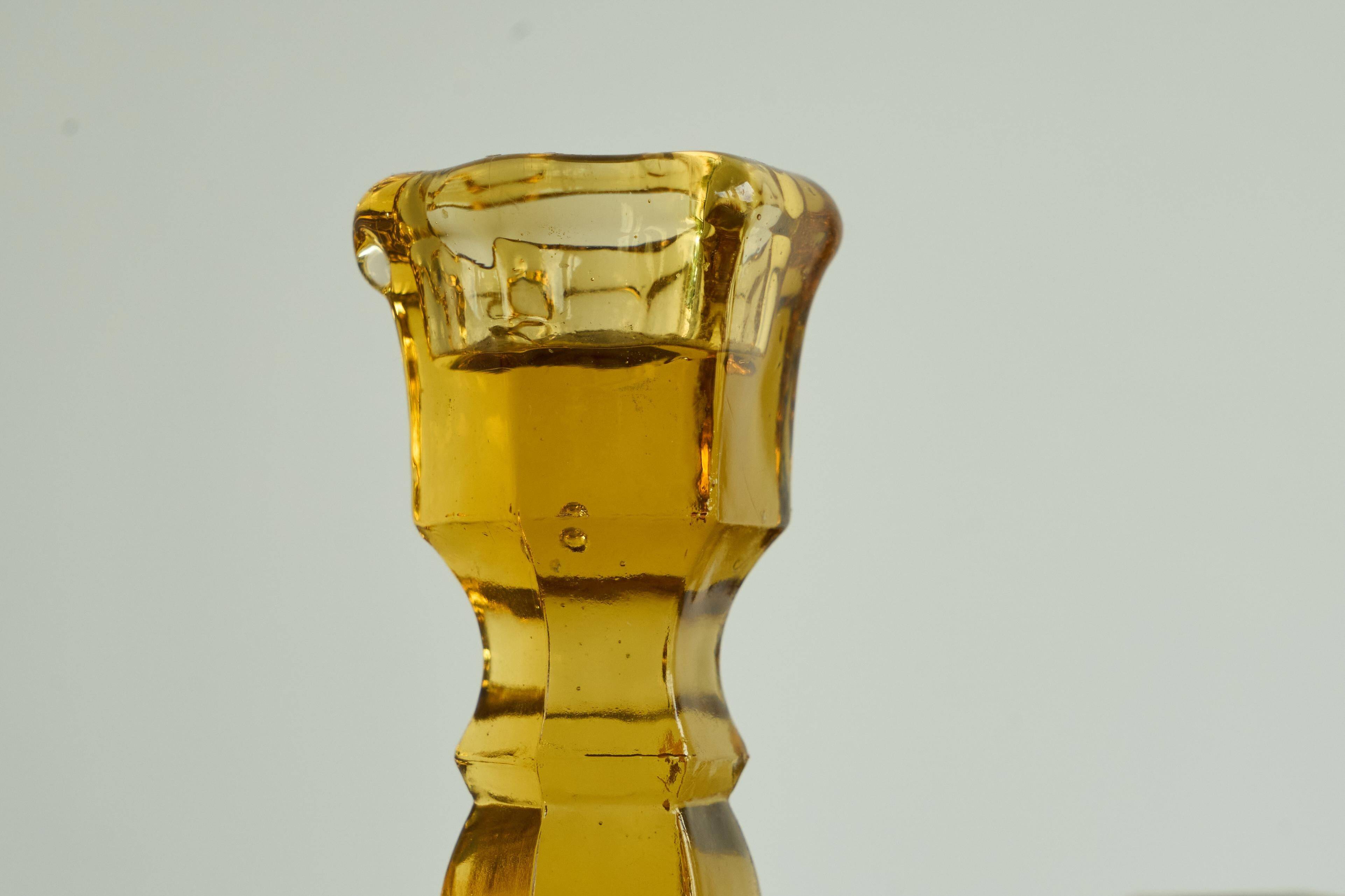 Pair of Art Deco candlesticks in pressed glass from the 1930s.