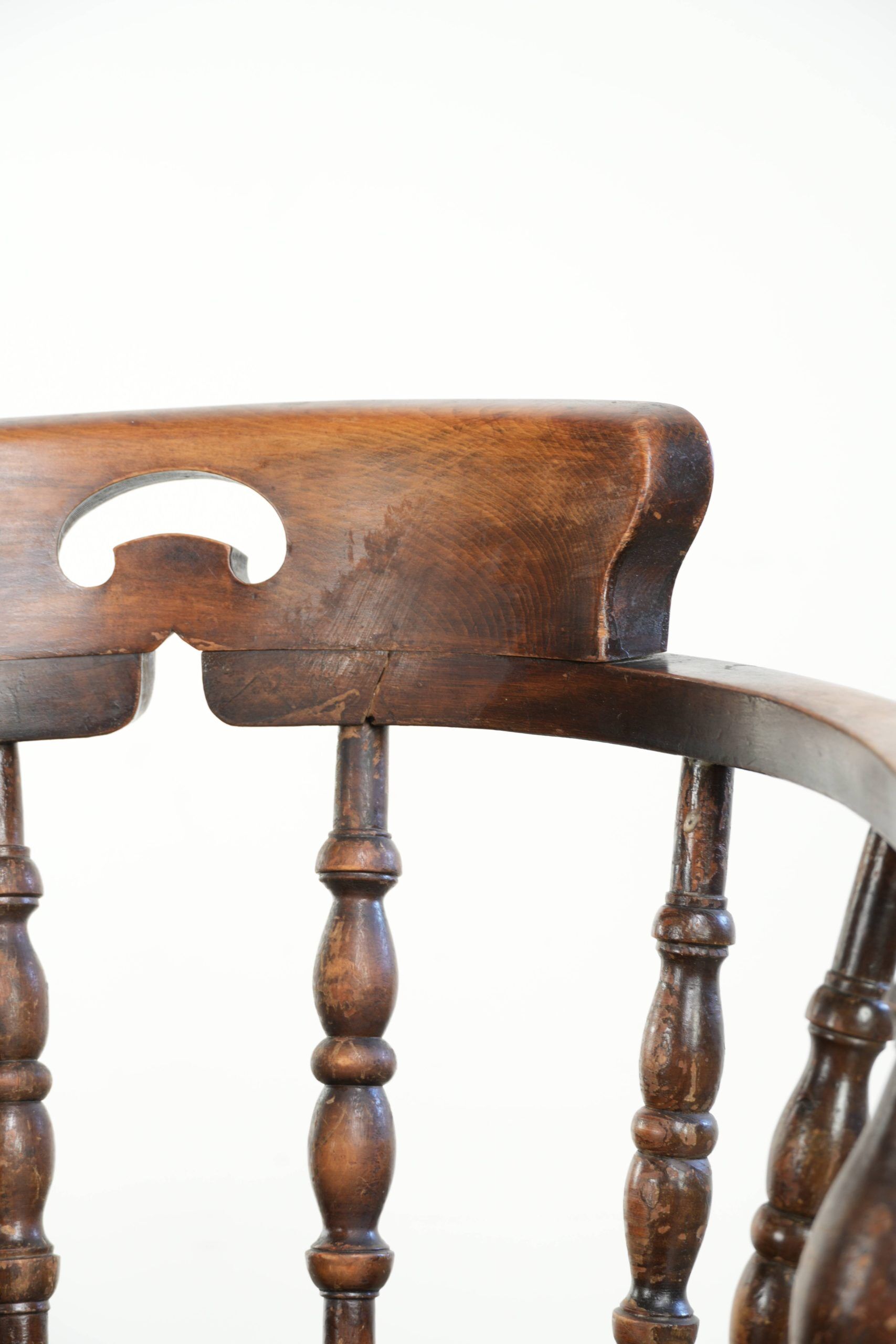 Set of two wooden English antique captain chairs from the late 19th century