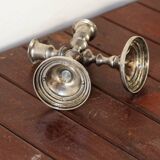 Pair of silver metal candlesticks