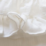Flying tablecloth made of white cotton gas and mismatched towels