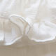 Nappe volantée en gaze de coton blanche et serviettes vichy jaune