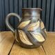 Vase ou pichet d'Alexandre Kostanda motif feuillages