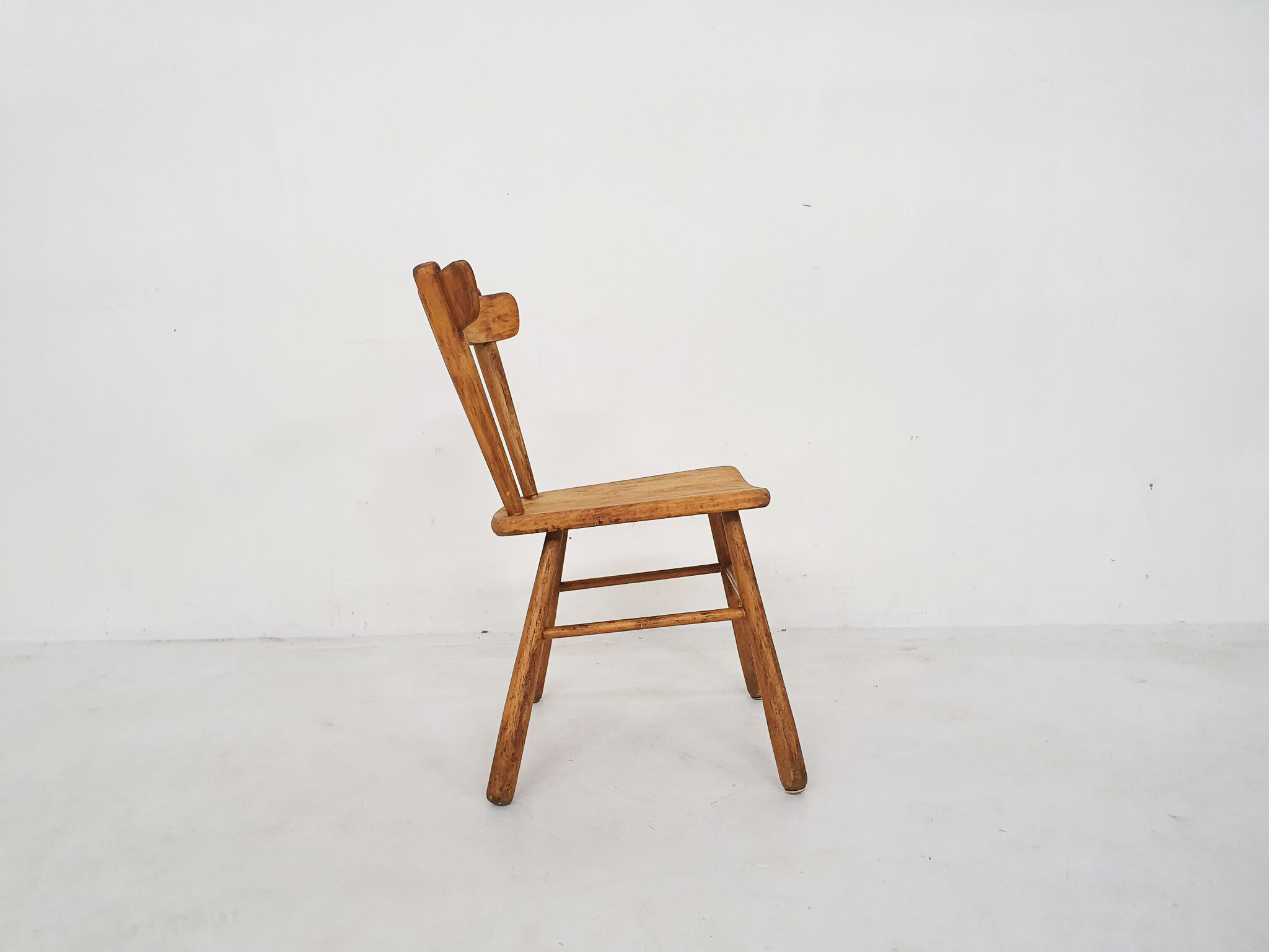 Scandinavian birchwood spindle back chair in the style of Ingvar Hildingson, Sweden 1950's