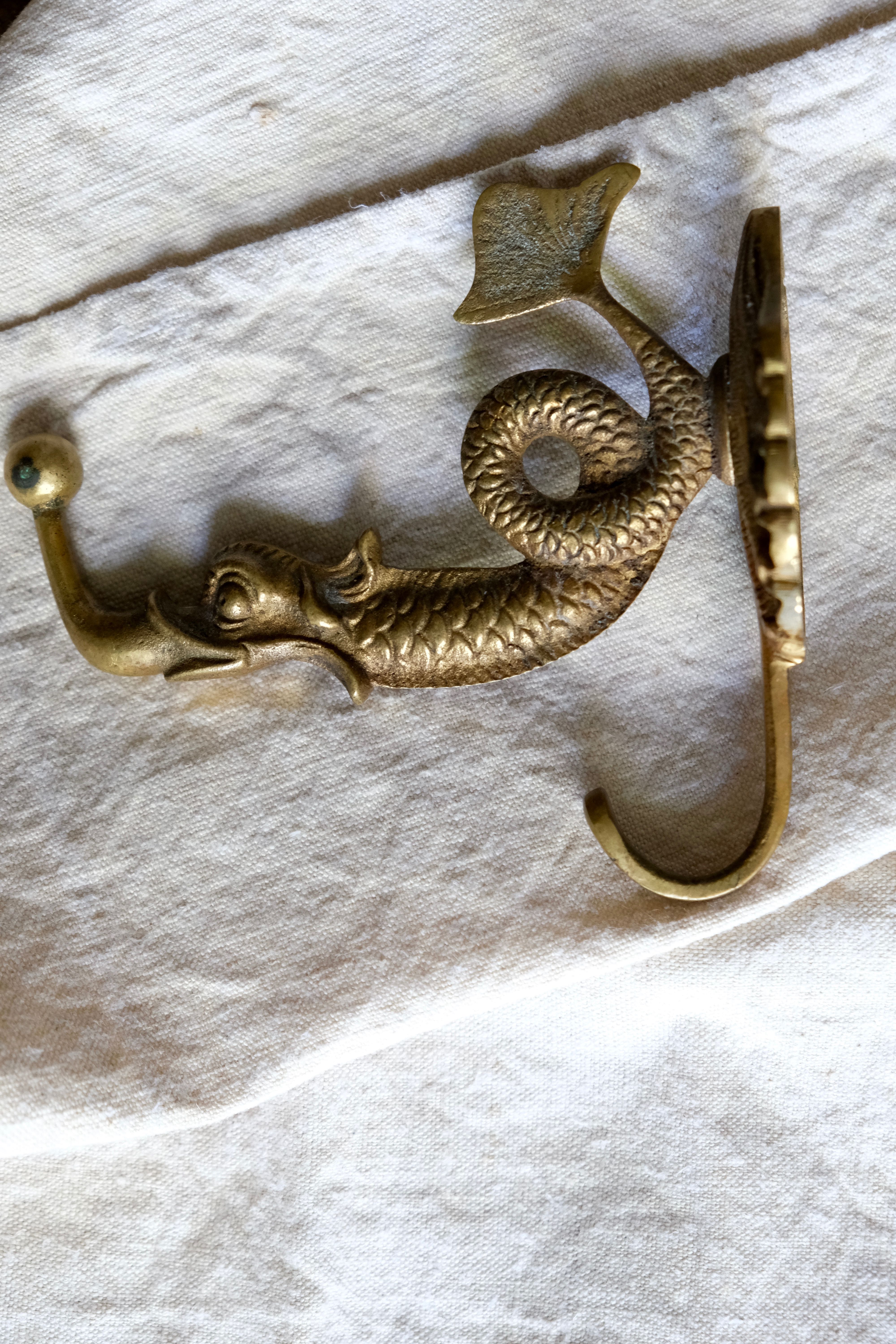Pair of solid brass double patères